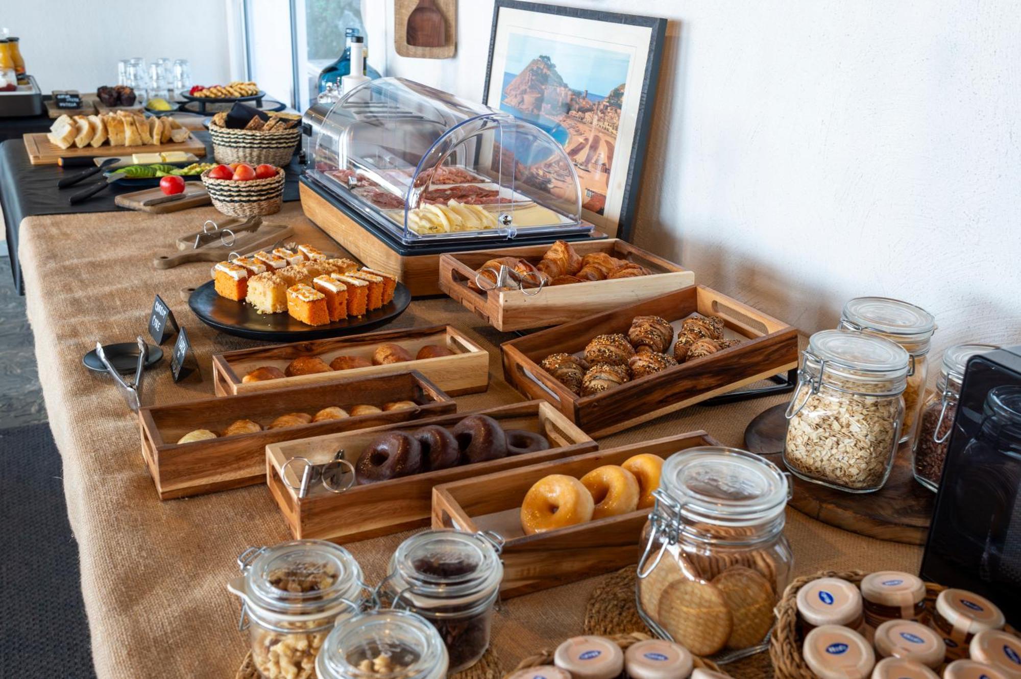 Hostal Boutique Es Menut Tossa de Mar Bagian luar foto